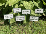 SET OF 6 PAINTED CAST IRON COMICAL PLANT SIGNS STAKES