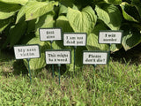 SET OF 6 PAINTED CAST IRON COMICAL PLANT SIGNS STAKES