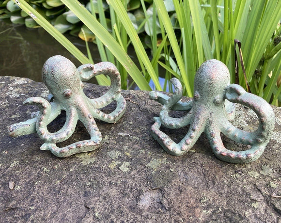 PAIR OF METAL CAST IRON OCTOPUS POND STATUE GARDEN ORNAMENTS.