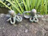 PAIR OF METAL CAST IRON OCTOPUS POND STATUE GARDEN ORNAMENTS.