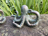 PAIR OF METAL CAST IRON OCTOPUS POND STATUE GARDEN ORNAMENTS.