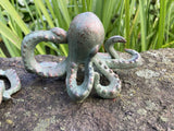 PAIR OF METAL CAST IRON OCTOPUS POND STATUE GARDEN ORNAMENTS.