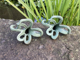 PAIR OF METAL CAST IRON OCTOPUS POND STATUE GARDEN ORNAMENTS.