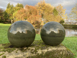 PAIR OF GREEN GLAZED TERRACOTTA BALLS / SPHERES GATE POST FINIALS