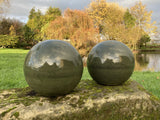 PAIR OF GREEN GLAZED TERRACOTTA BALLS / SPHERES GATE POST FINIALS