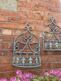 PAIR OF SMALL BLUE METAL HANGING GARDEN WALL PLANTERS