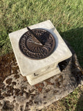 SMALL CAST IRON BROWN SUNDIAL ON STONE GARDEN SQUARE PLINTH SUNDIAL ORNAMENT