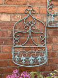 PAIR OF LARGE BLUE METAL HANGING GARDEN WALL PLANTERS
