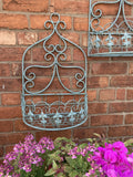 PAIR OF LARGE BLUE METAL HANGING GARDEN WALL PLANTERS