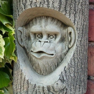 STONE GARDEN CHIMP PEEPING OUT OF LOG PLAQUE