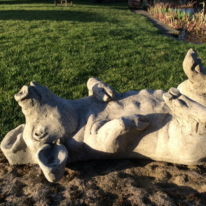 STONE GARDEN LYING UPSIDE DOWN PIG