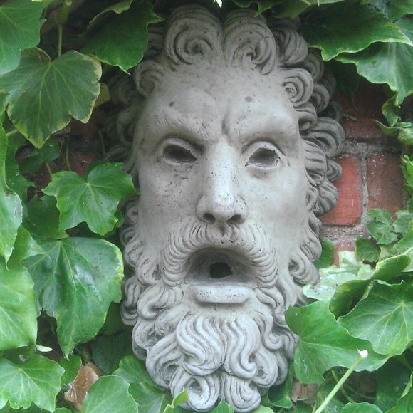 Stone garden wall water spout man face feature fountain god head plaque bearded man ferney heyes