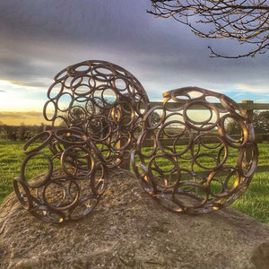 Metal garden sculpture open sphere spheres ferney Heyes cheshire gardening statement britishmade ferney13