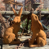 PAIR OF RUSTY COLD CAST IRON HARE ORNAMENTS HARES STATUES