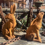 PAIR OF RUSTY COLD CAST IRON HARE ORNAMENTS HARES STATUES