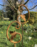 PAIR OF RUSTY METAL SCROLL LEAF PLANT SUPPORTS SWIRL STAKES GARDEN DECORATIONS