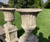 STONE GARDEN PAIR OF VICTORIAN STYLE URNS ON PLINTHS